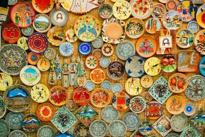 Colorful handmade Armenian ceramic plates with pomegranate and cultural motifs